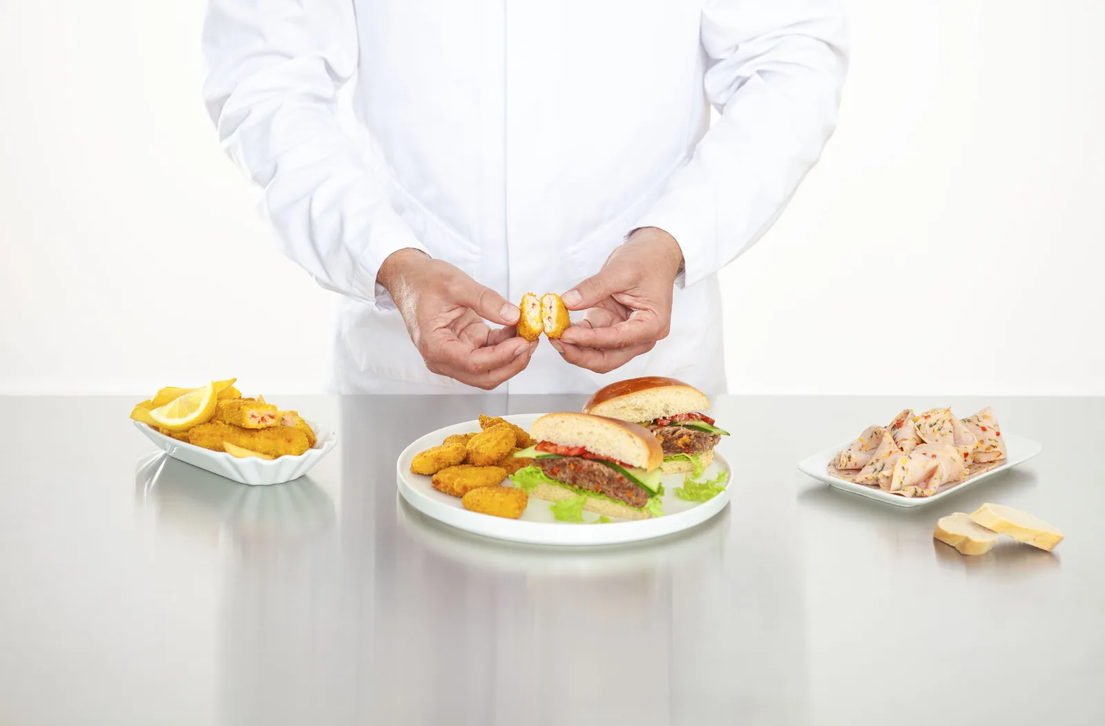 Food technologist developing a hybrid meat application in a development kitchen