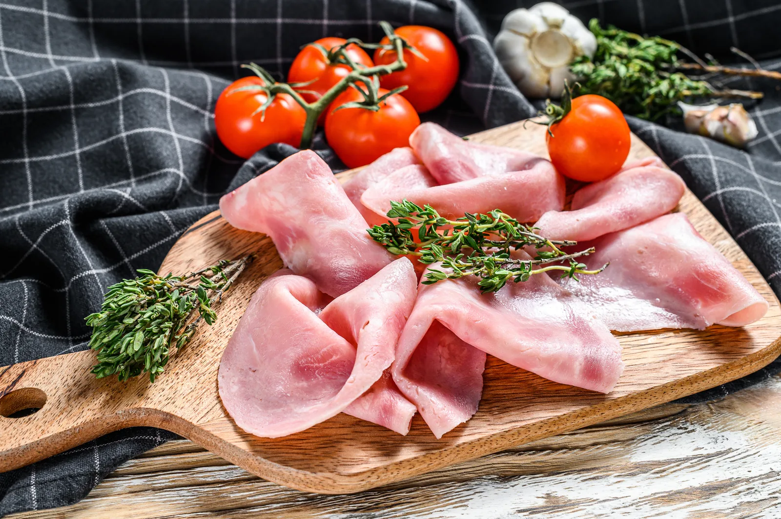 Thinly sliced cooked and cured ham